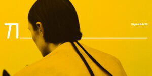 Back view of a person with short dark hair against a bold yellow background, wearing a Rick Owens bra.