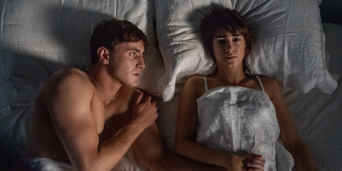 A man and woman lying in bed, highlighting the gap between cinematic portrayals of intimacy and real-life female pleasure.