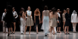 Models walk and pose during Moldovan Brands Runway AW25 in Chișinău, showcasing minimalist, avant-garde designs that merge tradition with modernity under the theme “Reframing.”