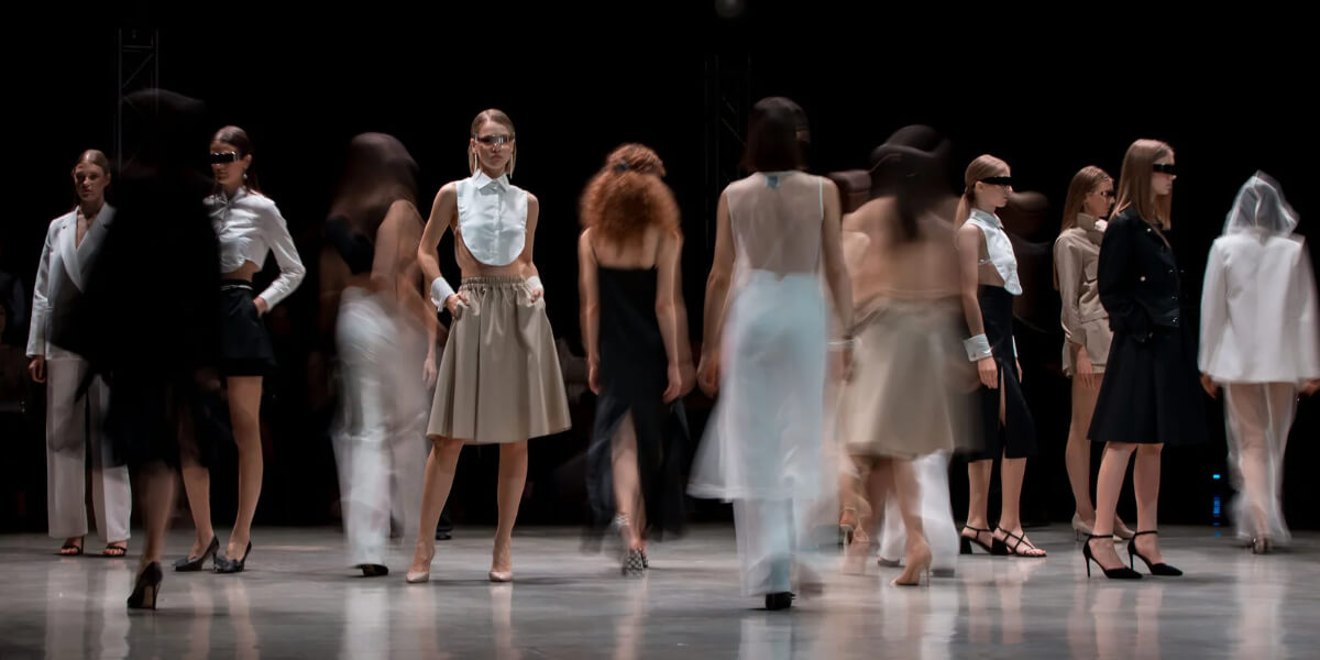 Models walk and pose during Moldovan Brands Runway AW25 in Chișinău, showcasing minimalist, avant-garde designs that merge tradition with modernity under the theme “Reframing.”