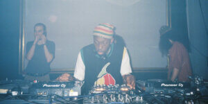 Touching Bass 10th anniversary event in Berlin with SHUSH, featuring Errol, Maxwell Owin, and dancers gathered around the soundsystem celebrating community-driven nightlife and Black diasporic music culture