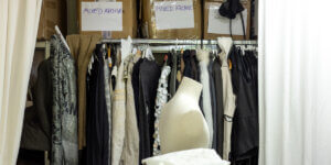 SF1OG Berlin studio with clothing rack, archival garments and mannequin
